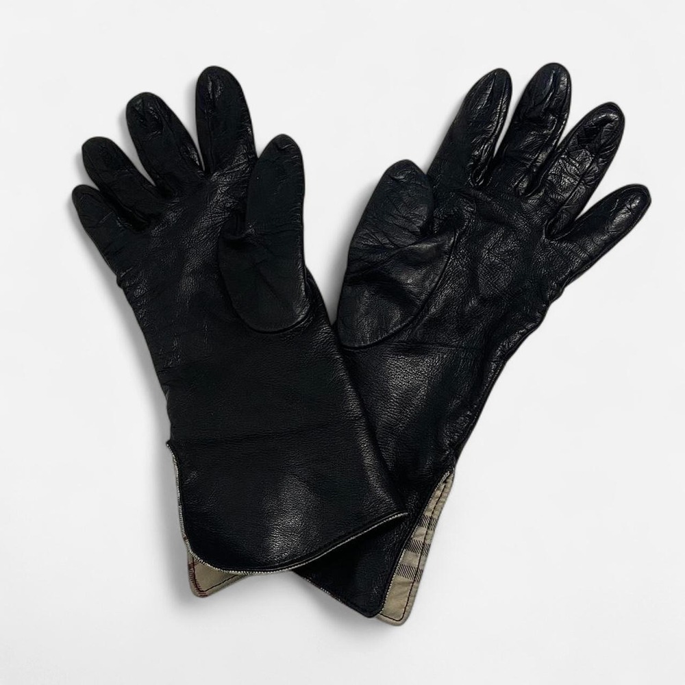 Burberry Black leather gloves with signature plaid lining
